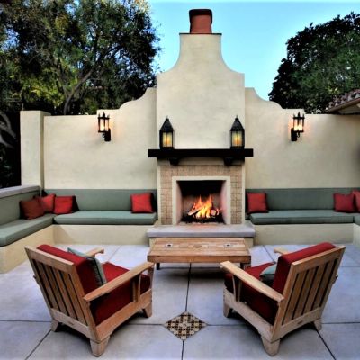 exterior-property-improvement-services-in-cape-town-and-johannesburg-construction-of-new-patio-paved-with-large-flagstones-and-diamond-shape-inlays-and-wood-fire-built-in-braai-with-lighting